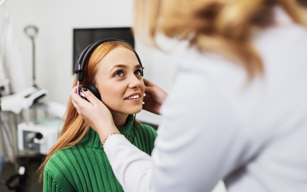 Audiologist conducting a hearing test for a patient in Wenatchee.